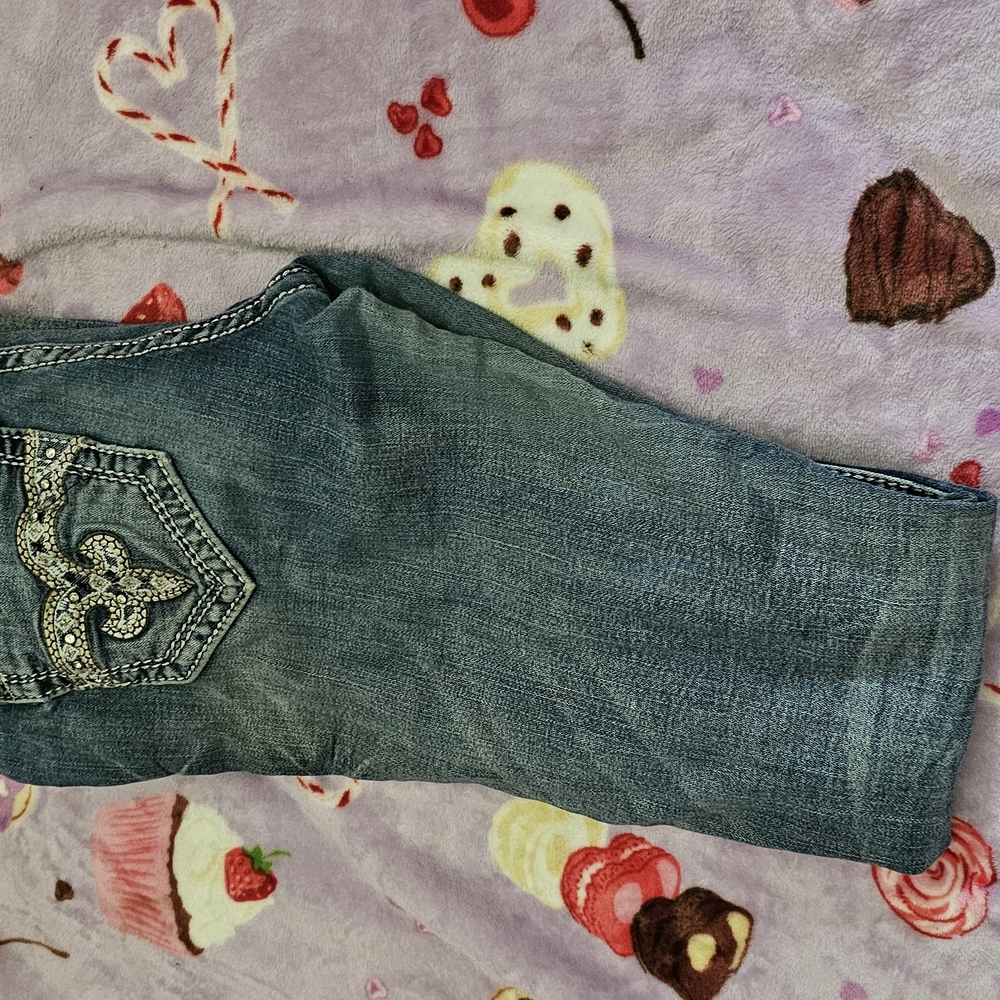 Blue Boot Cut Jeans with Medium to Dark Wash and Intricate Embroidery